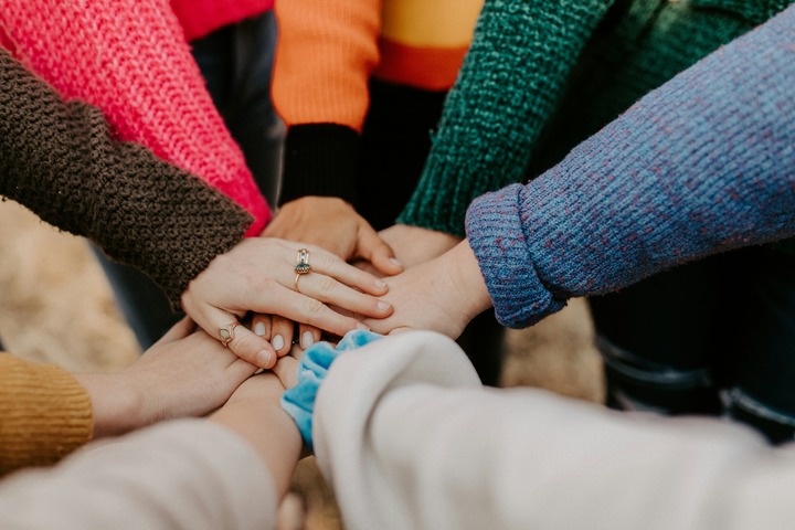 Members working together during a company activity